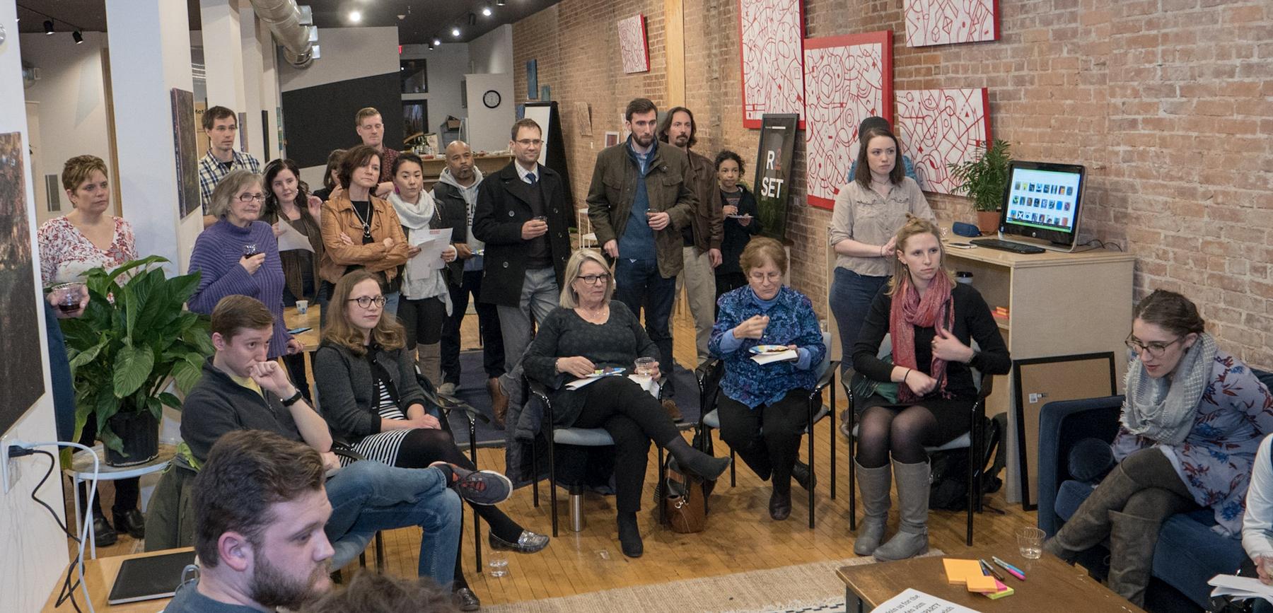 A packed gallery of residents seated and standing at the Small Cities Big Futures Idea Jam